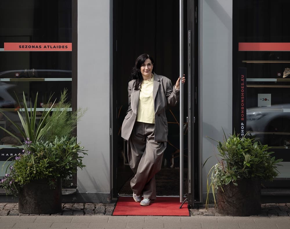 Jana Lindberga, founder of Bonbon Shoes, at the boutique entrance in Rīga